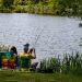 A Couple fishing in a beautiful lake