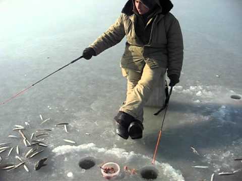 A man trying to catch smelts