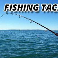 A Man fishing with fishing rod in the sea