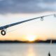 A Fishing Rod Setting Up On The Lake.