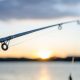 A Fishing Rod Setting Up On The Lake.